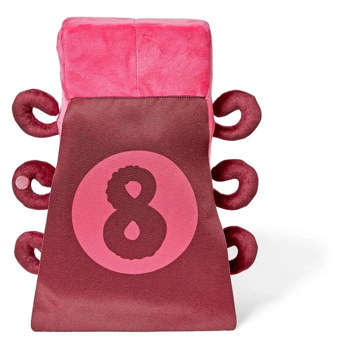 Back of a pink blocky plush toy wearing a maroon superhero cape with a large number 8 and six curly pink limbs.