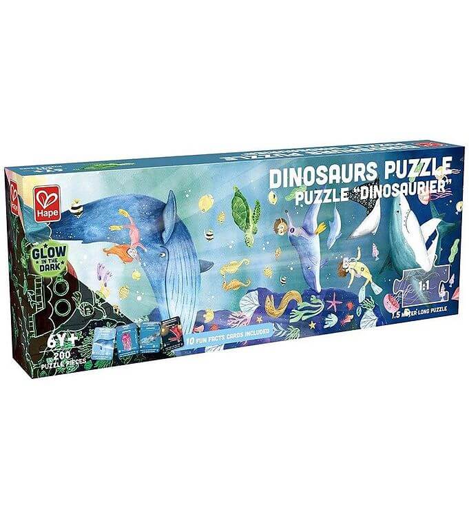 Hape 200-piece glow-in-the-dark puzzle box featuring an illustrated blue whale, sea turtle, and manta ray scene.