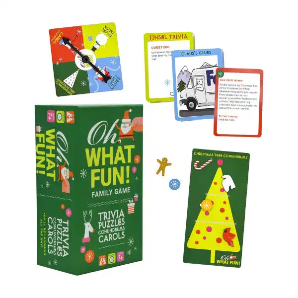 Green holiday game box with a colorful spinner, trivia cards, and a yellow tree puzzle board with festive graphics.