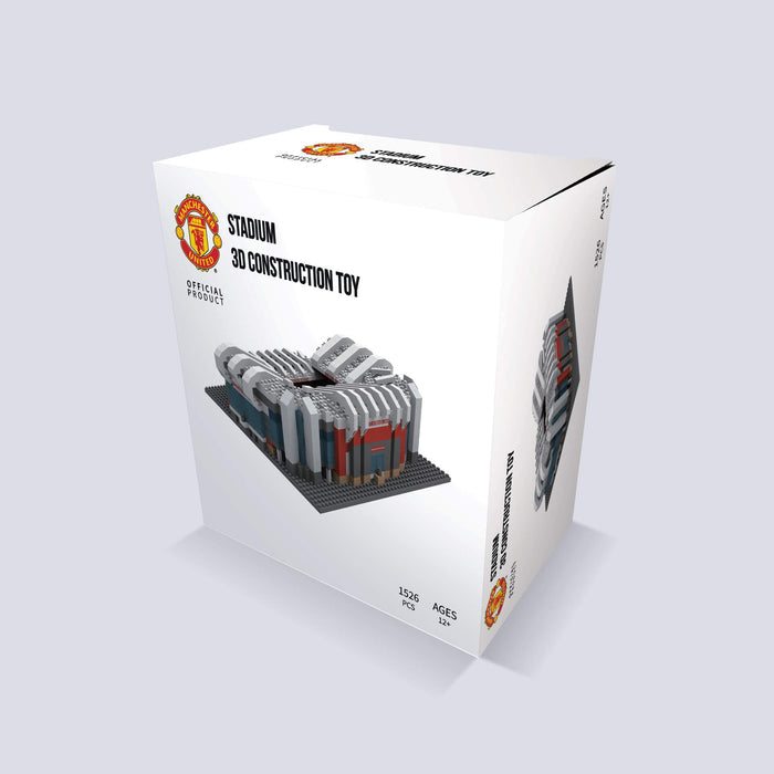 White box for Manchester United 3D construction toy featuring a detailed gray and red block model of the stadium.