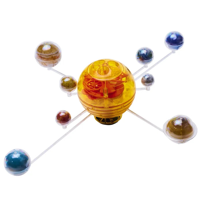 Translucent yellow sphere with internal gears surrounded by eight small colorful spheres on clear plastic arms.