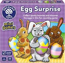 Purple box for Egg Surprise game featuring three illustrated bunnies holding large, colorful patterned Easter eggs.