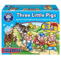 Blue square Orchard Toys box for Three Little Pigs game with cartoon pigs on a path and a wolf blowing down a house.