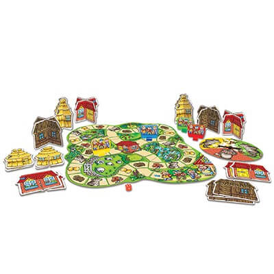 Colorful board game with a green path board, stand-up houses, pig characters, a spinner, and a red die.