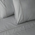 Organic cotton coloured sheet set in greystone with 250 thread count, featuring soft, smooth fabric from Whites of London NZ.