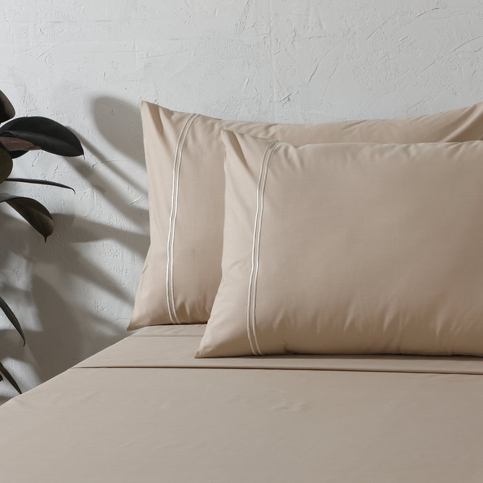 Organic cotton coloured sheet set in hummus tone, 250 thread count, by Whites of London NZ, featuring soft, comfortable bedding.