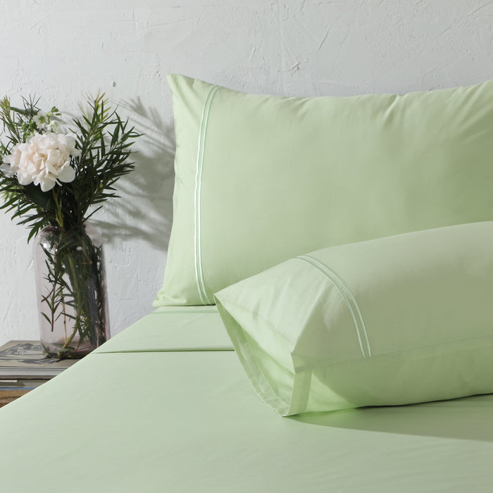 Organic cotton colored sheet set in reef blue with 250 thread count, featuring fitted and flat sheets from Whites of London NZ.