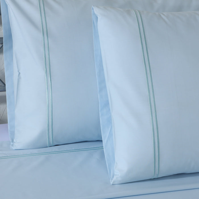 Organic cotton coloured sheet set in sky blue with 250 thread count, from Whites of London NZ. Soft, comfortable bedding.