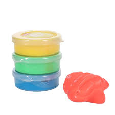 Stacked round tubs of yellow, green, and blue putty next to a textured red putty blob.