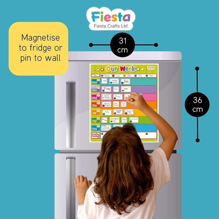 A child uses a colorful 31x36cm magnetic weekly planner on a fridge, featuring removable name and activity magnets.