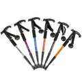 Dark purple outdoor folding trekking poles by Mead's Supply, lightweight 4-section aluminum alloy hiking poles, compact and portable.