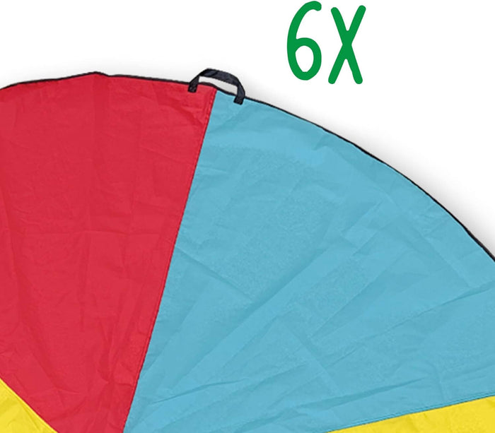 Close-up of a multi-colored nylon play parachute with red, blue, and yellow panels and a black handle loop.