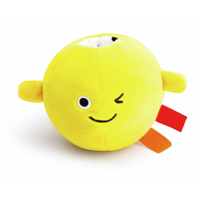 Spherical yellow plush toy with a winking face, small arms, colorful ribbons, and an opening on top.