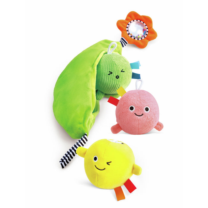 Green plush pea pod with three round smiling characters in green, pink, and yellow, plus an orange flower rattle.
