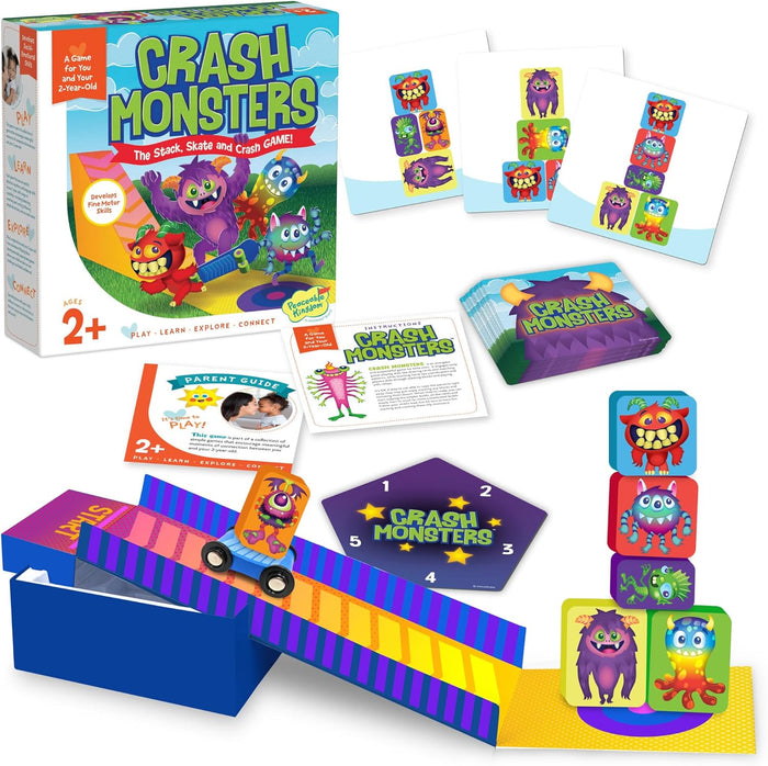 Toddler game featuring colorful monster-themed blocks, challenge cards, and a purple cardboard ramp next to the box.