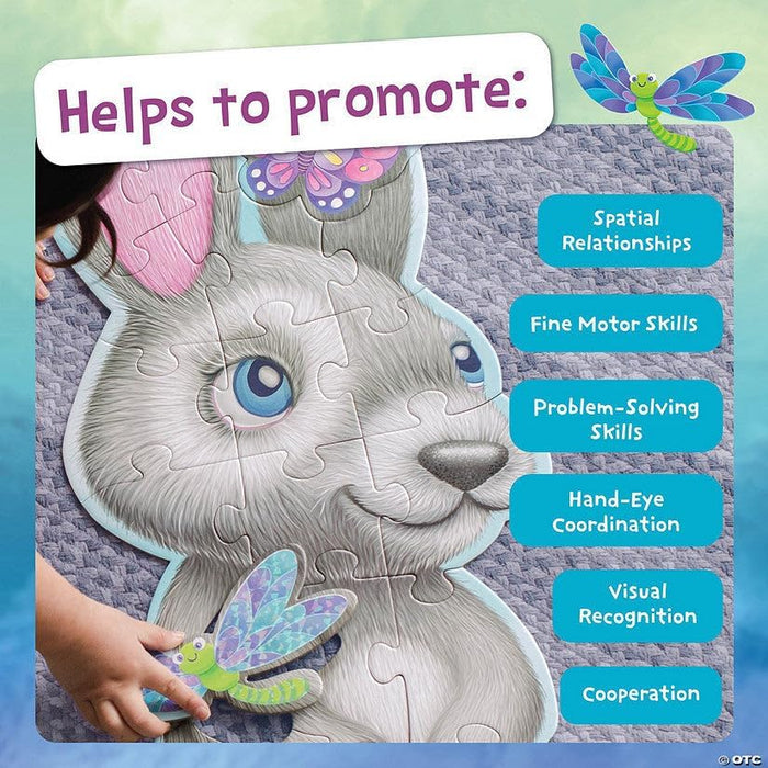 Child assembling a shimmery gray bunny shaped floor puzzle. Text lists developmental benefits like fine motor skills.