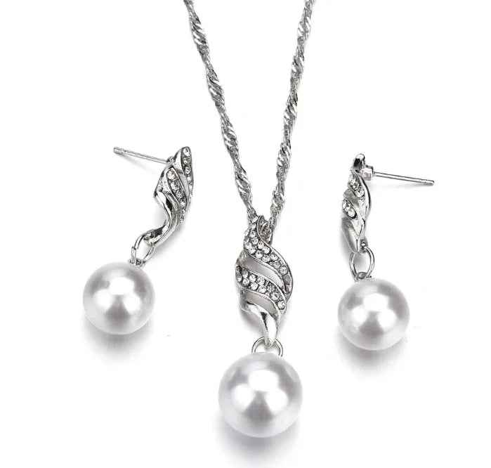 Stylish 3Sixty5 pearl jewelry gift set featuring golden pearl necklace and matching earrings displayed on a white background.