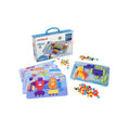 Brightly colored mushroom pegs with a clear board, illustrated robot cards, and a blue carrying case.