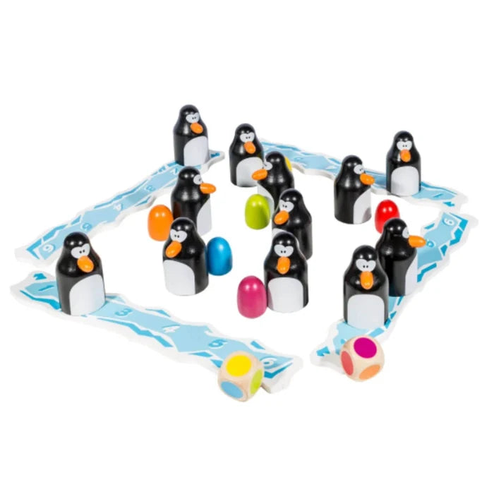Black and white wooden penguins hiding colorful eggs on numbered blue ice tiles with two matching colored dice.