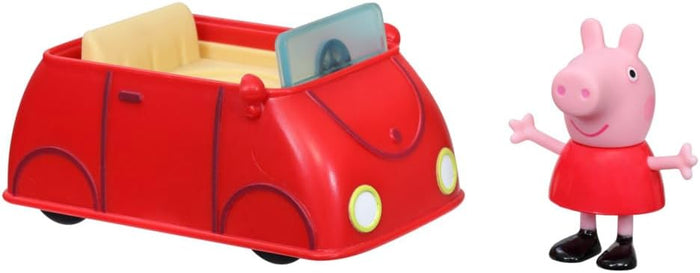 Red toy car with yellow interior and a pink Peppa Pig figure in a red dress with arms outstretched.