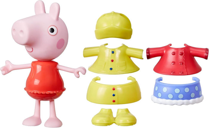 Peppa Pig toy figure in a red dress with yellow rain gear and a red coat with a blue polka-dot skirt.