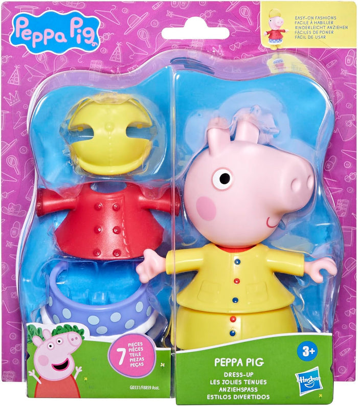 Pink pig figure in a yellow raincoat with extra red and blue outfits and a yellow hat in purple and green packaging.