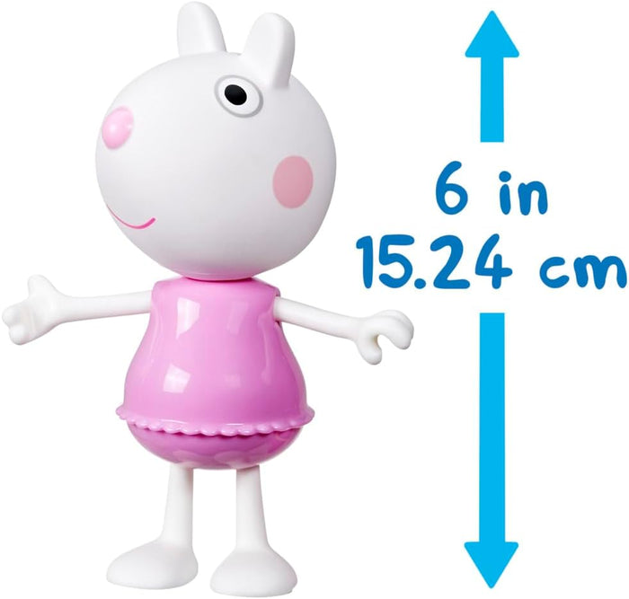 Suzy Sheep toy figure in a pink dress. A blue graphic shows it stands 6 inches or 15.24 cm tall.
