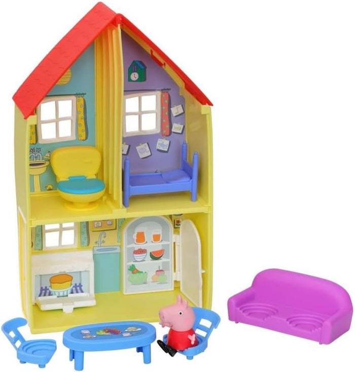 Two-story yellow toy house with red roof, interior rooms, blue furniture, purple sofa, and a pink pig figurine.