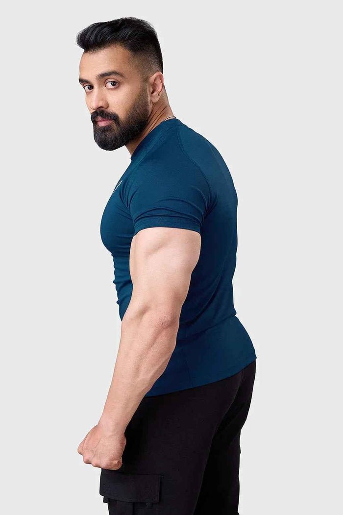 Fuaark Nz teal performance T-shirt for men, lightweight and breathable, shown flat with short sleeves and round neckline.