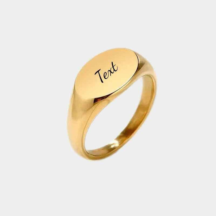Personalised silver stainless steel oval signet ring from Glitters, showcasing a sleek, polished design with customizable engraved details.
