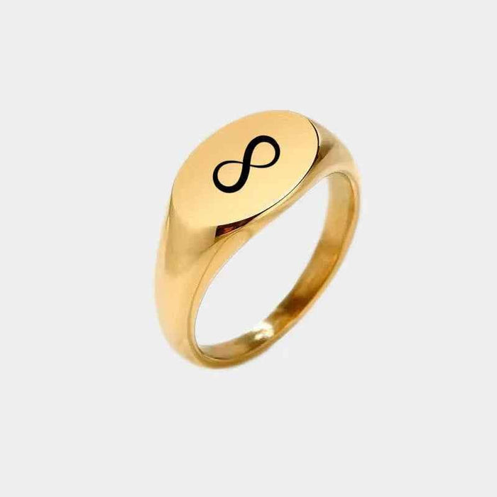 Personalised stainless steel oval signet ring in silver from Glitters, showcasing a smooth, polished design with engraved customization area.