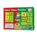 Red and green game box featuring number puzzle pieces, words, and bundles of sticks next to a cartoon birthday cake.