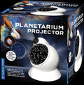 White dome-shaped projector on a space-themed box displaying constellation maps, a space shuttle, and nebulas.