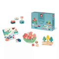 Wooden toy set for 24+ months with a crocodile rocker, tree-shaped peg toy, and puzzle in soft pastel colors.