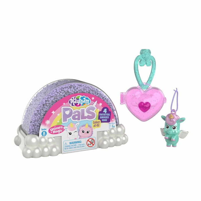 Purple Playfoam in a rainbow container with a pink heart locket and a mint green winged unicorn figurine.