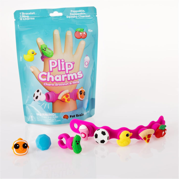 Teal toy pouch with a pink bracelet and ring plus squishy charms including a soccer ball, yellow duck, and pizza slice.