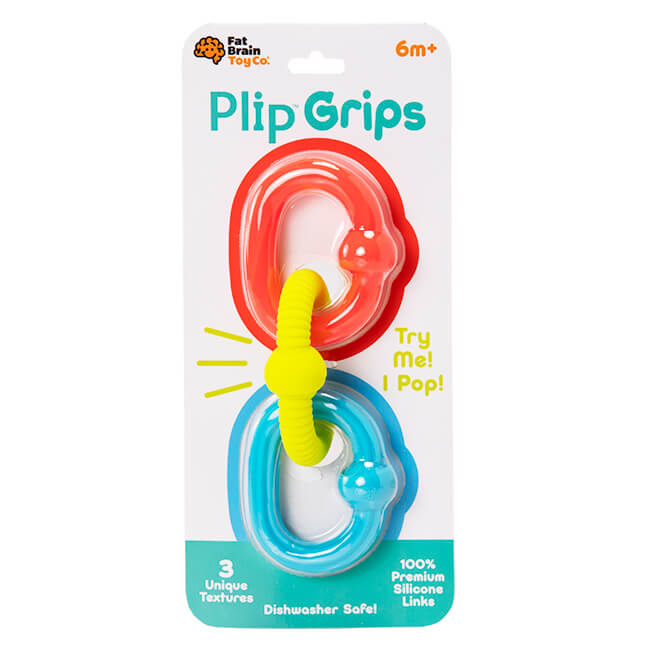Three interlocking silicone rings in bright orange, textured yellow, and blue, shown in white retail packaging.