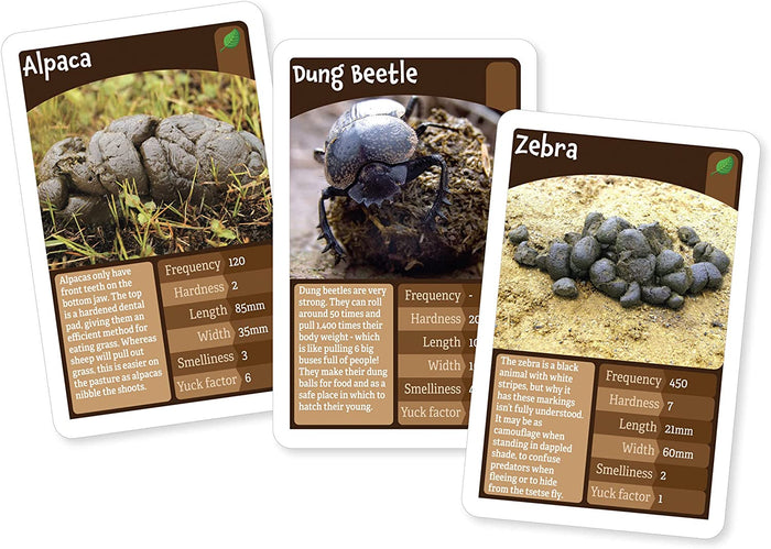 Three brown cards with photos of alpaca droppings, a dung beetle, and zebra dung above tables of game statistics.