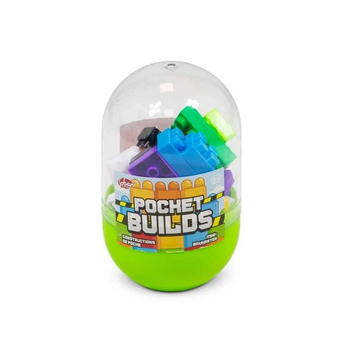 Capsule toy with a lime green base and clear top showing colorful plastic building bricks inside.