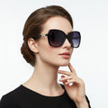 Dealonlinenz polarized gradient lens sunglasses in black with sleek frame, showcasing stylish design and tinted lenses.