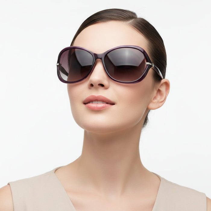 Purple dealonlinenz sunglasses with polarized lenses and rhinestone embellishments, stylish and fashionable accessory.