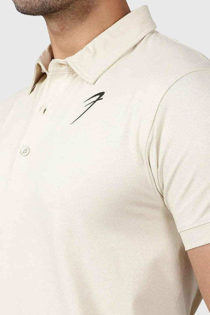 Beige Polo T-shirt from Fuaark NZ, casual men's polo shirt with a classic collar and short sleeves, on a plain background.