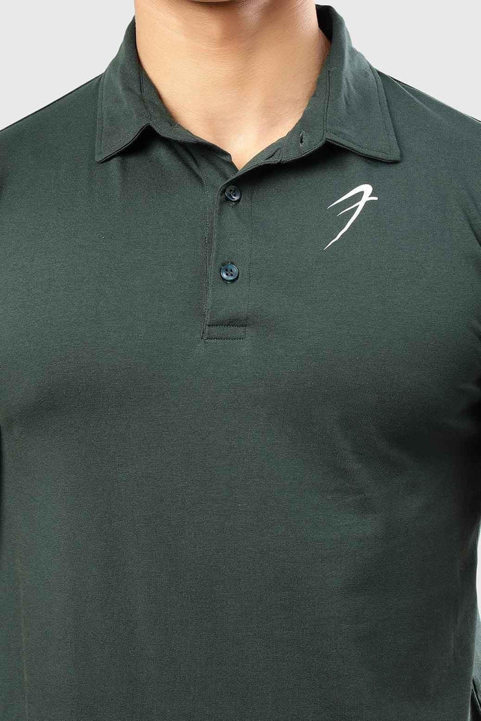 Green Polo T-shirt by Fuaark Nz, featuring a classic collar and short sleeves, displayed on a plain background.