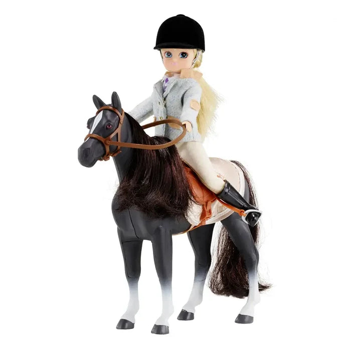 Blonde doll in a grey riding jacket and black hat on a black horse with white legs and a brown saddle.
