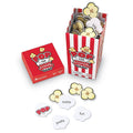 Red striped popcorn box game with kernel-shaped cards featuring sight words like big, today, fun, and pretty.