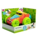 Red toy car with large green wheels and a yellow driver, displayed in a green and white illustrated retail box.