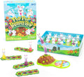 Board game box with jumping bunny hill, spinner, and colorful rabbit figurines on a flowery meadow-themed board.