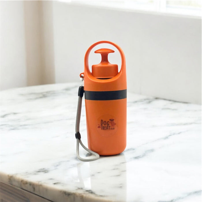 Portable pooper scooper from DogTreatNZ with a lightweight handle and scoop for easy dog waste cleanup.