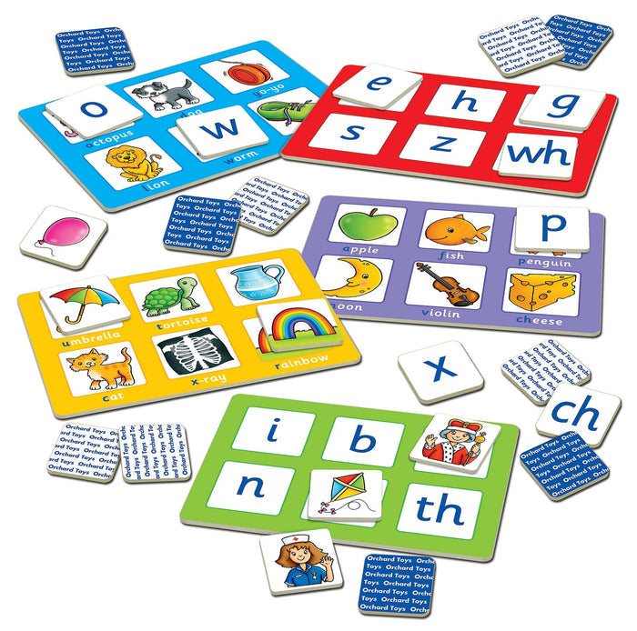 Colorful phonics game boards with letter and picture tiles like a cat, apple, and penguin for matching play.