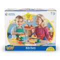 Box art showing two kids with a colorful 76-piece toy kitchen set including a yellow kettle, plates, and utensils.